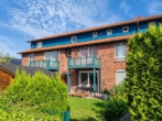 Blick in den Garten - Zur Kapitalanlage! 3-Zimmer Eigentumswohnung mit großer Terrasse und kleinem Gartenanteil
