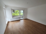 Wohnzimmer - Schöne 2-Zimmer-Single-Wohnung in Wolfsburg-Neuhaus